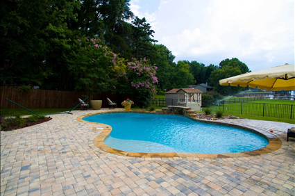 Comparing Concrete Gunite Swimming Pools to Fiberglass Pools